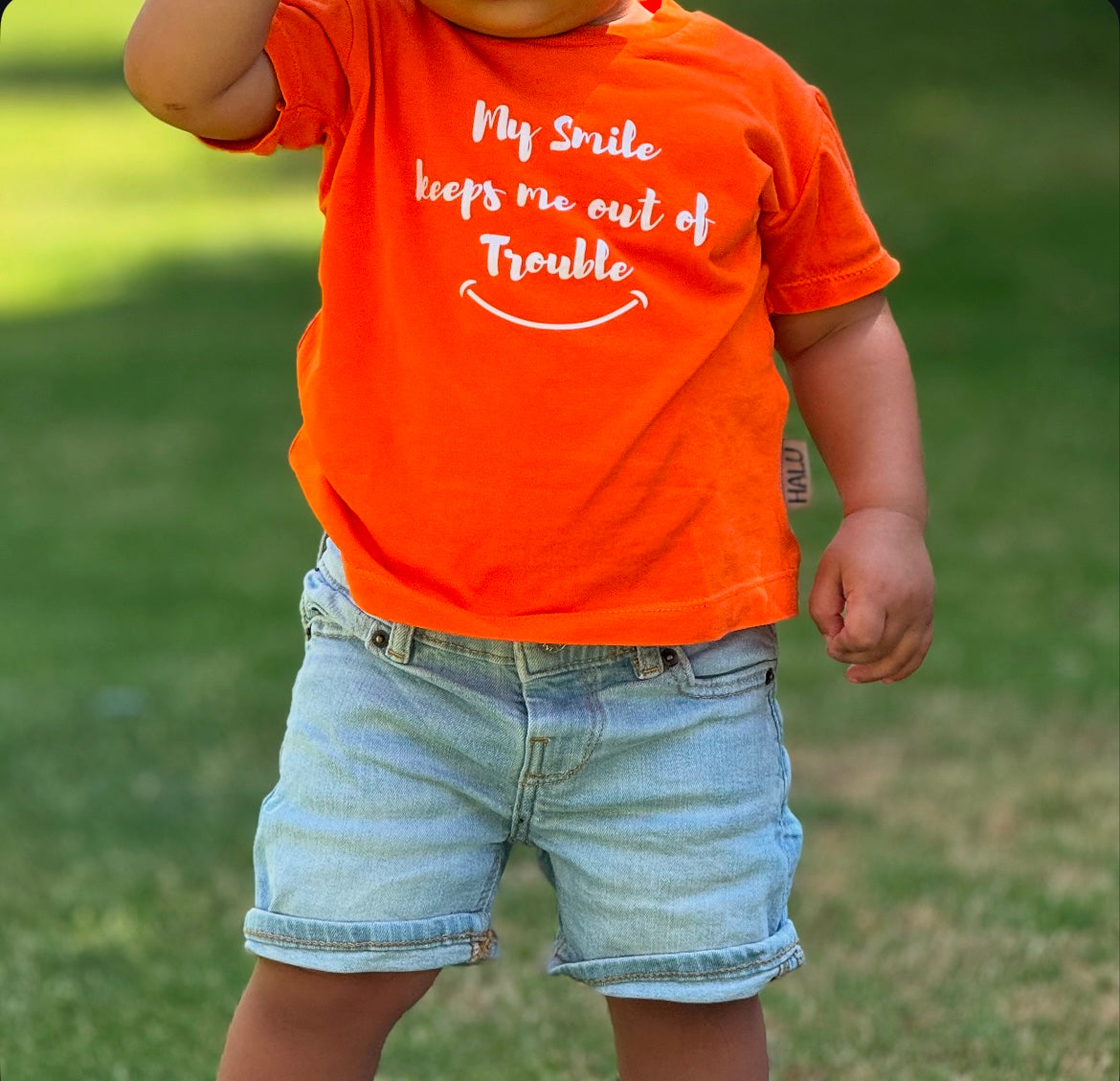 My smile keeps me out of trouble Tshirt